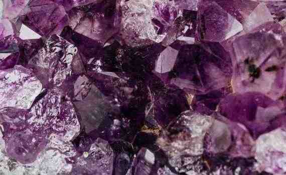 Set of shiny transparent amethysts grown together